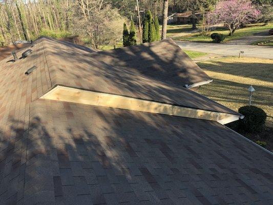 Close up of the new roof in Decatur where we replaced the old roof and rotten boards.