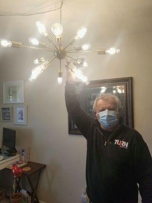 Steve installed the chandelier for dining room