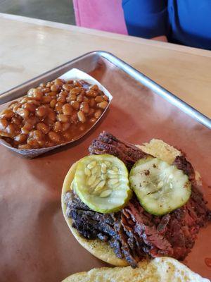 Brisket sandwich, baked beans.