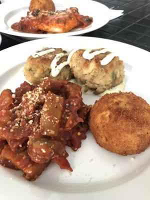 Crabcakes, potato croquette, eggplant caponata