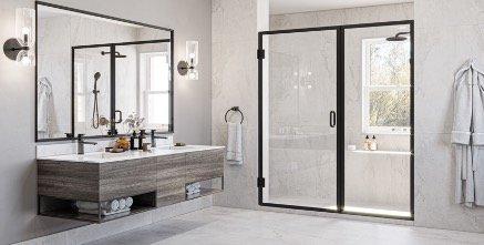 Matching black framed mirror and shower enclosure