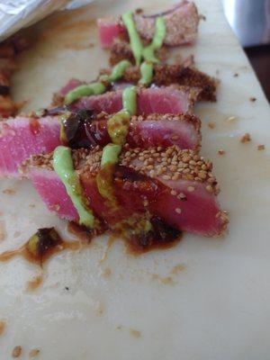 This is our famous Sesame Seared Ahi Tuna drizzled with Wasabi Vinaigrette & Sweet Basil, Honey Soy Sauce Glaze.