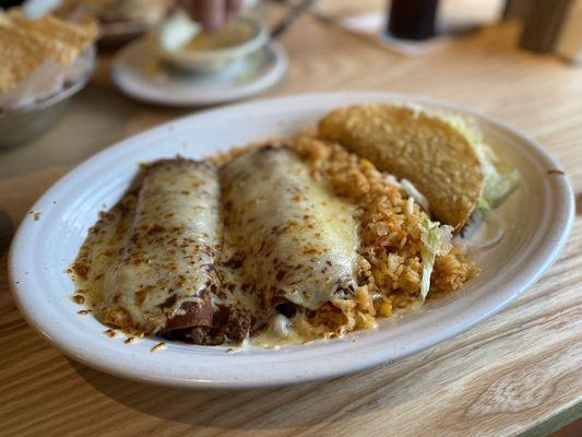 Number 1 combination. 2 Enchiladas and taco with Mexican rice