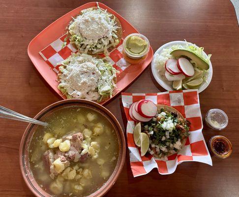 Pozole with tostadas and a suadero taco.