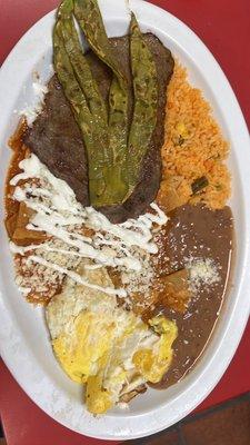 Chilaquiles , they usually don't come with the nopales on the meat but I ordered it extra .