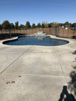 Freeform Pool with water feature.