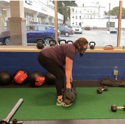 Our newest member Ellen learned to perform Sandbag Deadlifts w/60lbs in just 2 weeks. What a Rockstar she is!