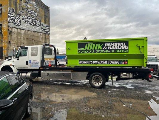 Richard's Universal Towing Junk removal bins available to rent.