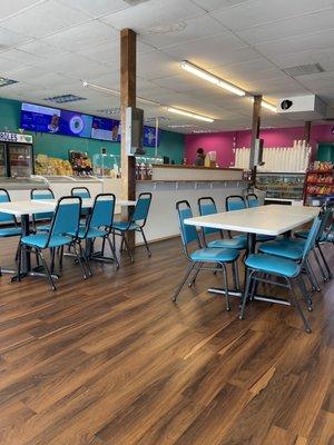 Dining area and order counter on far wall.