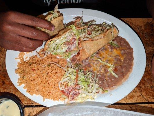 Beef tacos, rice and beans