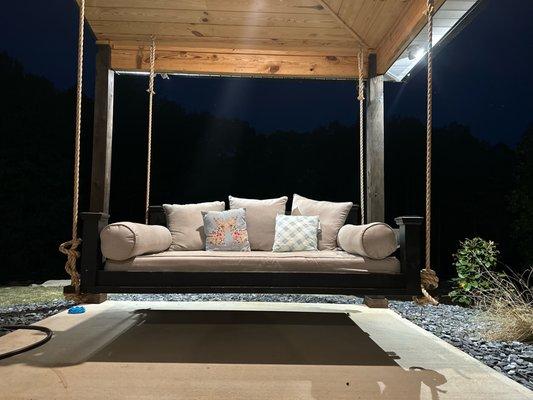 The Maple Barndominium  Front Porch Swing Comfortable and Inviting