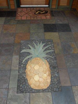 Pineapple Medallion at Entry using various shades of quartzite stone.