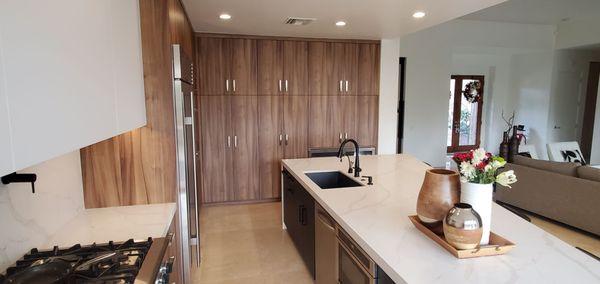 Full wall of pantry cabinets with plenty of storage