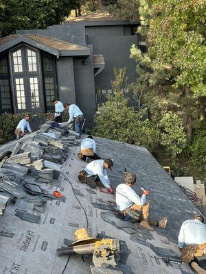 New slate tile roof ( 12000 sq ) special order tile from Italy. Hollywood hills