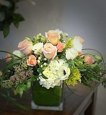 Perfect peach and white flower centerpiece for weddings, baby showers or just because.