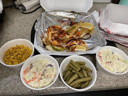 Fish, shrimp (grilled) with sides.