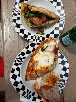 Meatball parm and sausage and broccoli rabe both on fresh rolls!