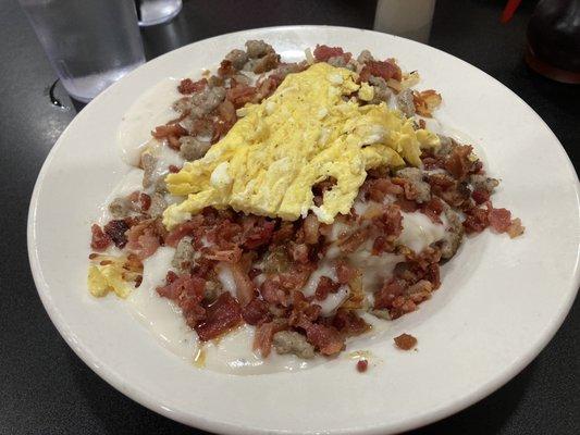 Country Debris......bacon, sausage, hash browns, biscuits, gravy, and pancakes on the side