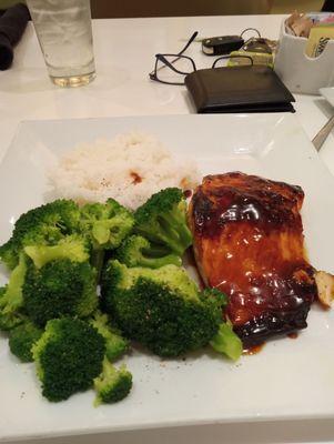 Perfectly cooked salmon in perfectly steamed broccoli and rice.