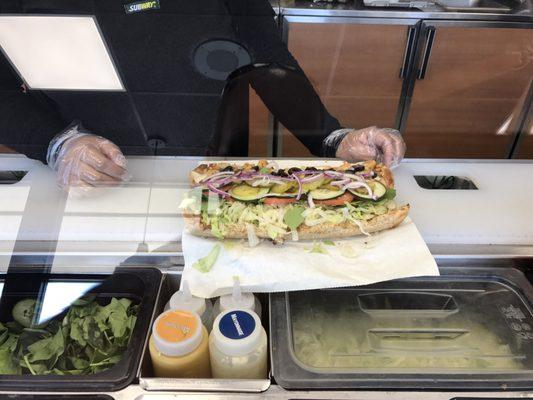 Here is the sub that they made for me, it is overflowing with veggies and has lots of chicken.