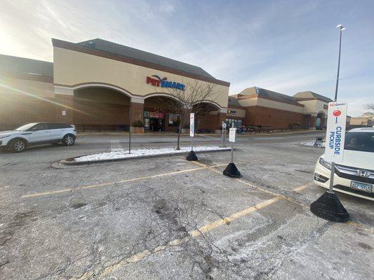 Curbside pickup has been placed where handicap accessible parking belongs.