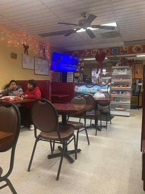 Front counter with pastry and helados