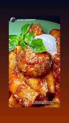 Sunday gravy, Rigatoni  pasta meatballs, sausage, piece of pork and ricotta