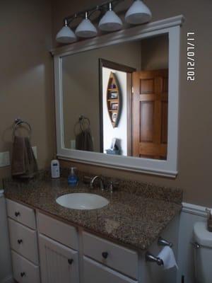 Pioneer  glazed maple cabinets with Cambria counter top.