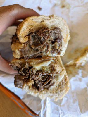 Balboa Beefsteak. $14.95. Comes with two kids of cheese, American and mozzarella.