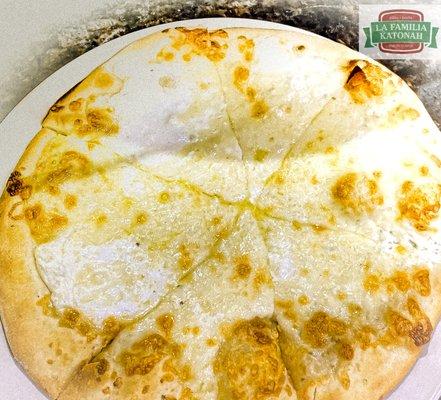 White Pizza -Mozzarella, Ricotta and Romano- Top it off with some grilled eggplant or spinach its the best