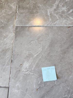 December 8th, less than 2 months after replacement. Tile between kitchen and dining room.