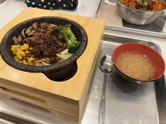 White rice w/ bulgogi, broccoli, corn, and bamboo. Got the Hot Stone option so my food would be warm