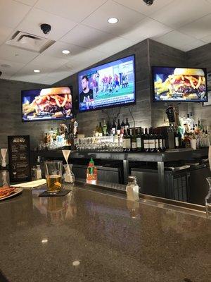 Tv's at the bar to keep up on sports and news