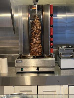 Shawarma roasting on a spit