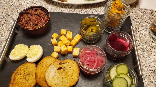 Relish tray - tapenade, fried olives, deviled eggs, pickled veggies