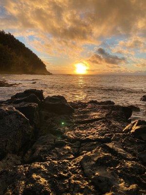 Sunrise at Hana. The shore is a minute away. It's rocky but beautiful.