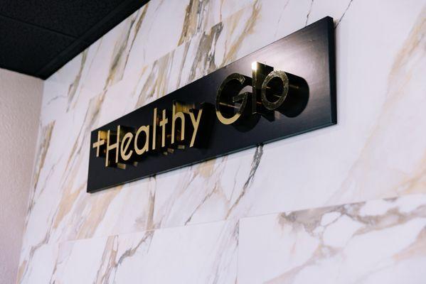 Healthy glo entry sign