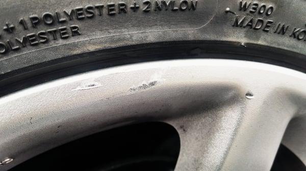 More damage from tire installation.