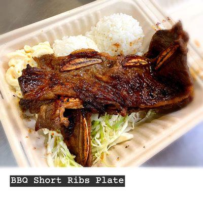 Steam Rice, Mac Salad and BBQ Short Ribs. Shredded Cabbage under the meat.