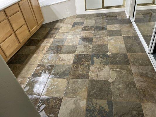 Stone tile cleaning with grout cleaning starting at $29.95