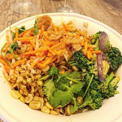 BOWL: brown rice, seasoned and grilled chicken, wok-seared veggies, corn, yellow curry, carrot daikon, cilantro, peanuts, crispy onions