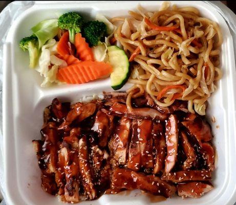 $17.00 platter of: Teriyaki chicken with white rice, chow mein, and veggies (lettuce, carrots, zucchini, and broccoli).