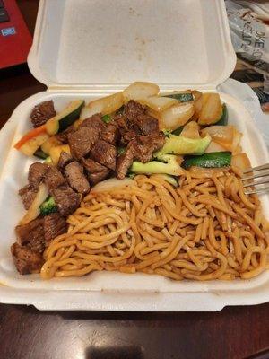 Hibachi vegetables with steak and noddles.