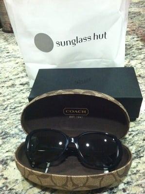 My new sunglasses and my husband's sunglasses case.