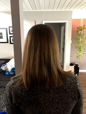 about 2 inches shorter in the back than the front- (which my husband noticed is uneven, by-the-way.)