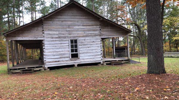 The rice log home on site at the park. It was moved from a few miles away to the park.