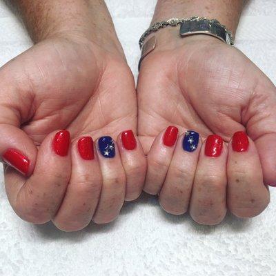 A new clients nails done at Pure Nails. Envying her nails for July 4th.  Come get yours done!