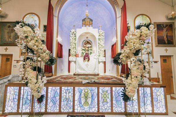 Glorious church alter flowers.