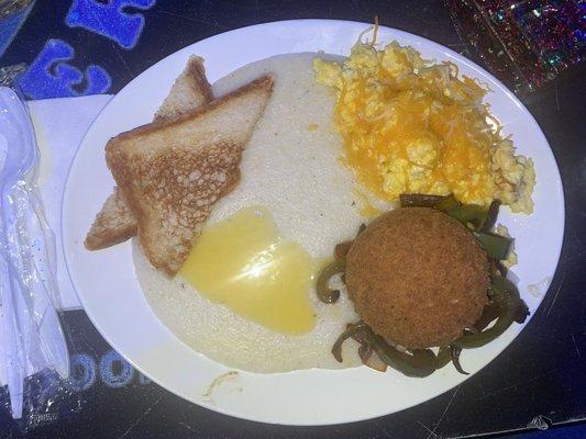 Salmon cake, grits, eggs and toast