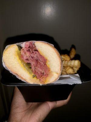 Pastrami Grinder with fries